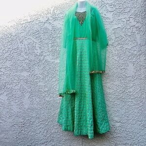 Formal raw silk Anarkali Indian gown green embroidered beaded wedding full skirt
